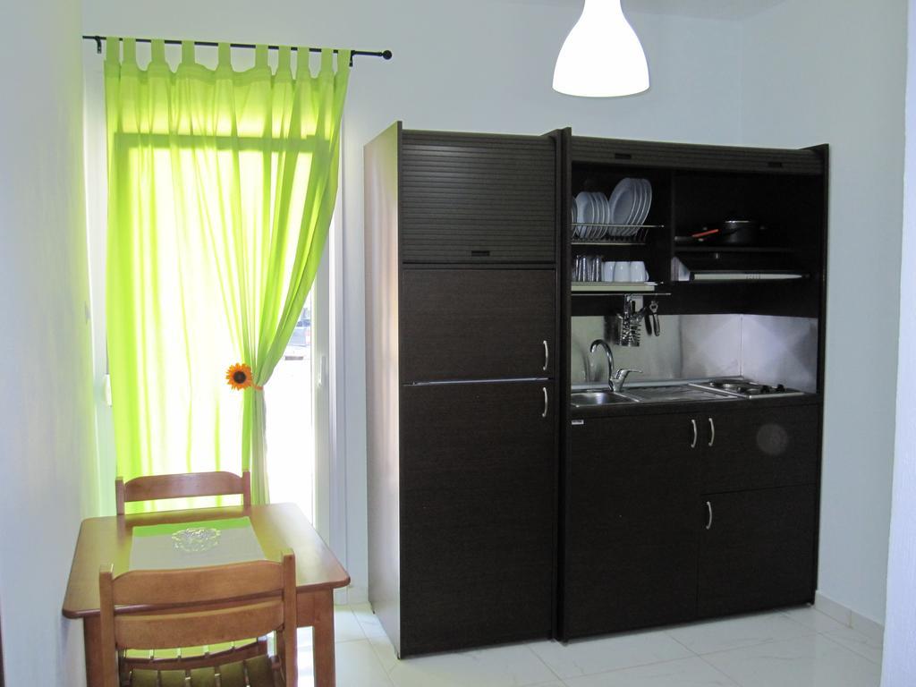 Metamorfosis Apartments Quarto foto